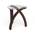 Table d'appoint moderne en verre, merisier, piètement en arceaux croisés, placage noyer