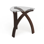 Table d'appoint moderne en verre, merisier, piètement en arceaux croisés, placage noyer